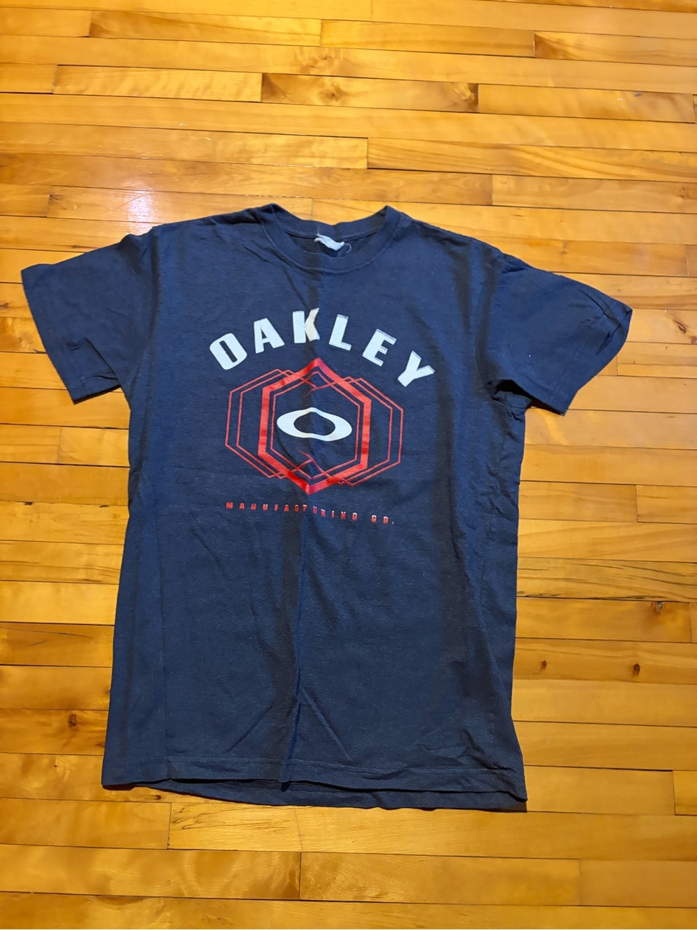 Oakley Navy Short‑Sleeve Graphic Tee with Red Accent